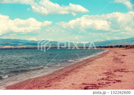 Seascape with beautiful cloudy sky. Tropic sea shore. Deserted beach. Marine landscape with ocean and blue sky 132262600
