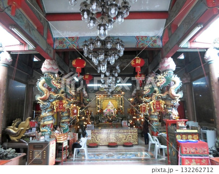 Ornate Temple Interior with Chandeliers, Dragon Statues, and Red Lanterns Ornate Temple Interior with Chandeliers, Dragon Statues, and Red Lanterns 132262712
