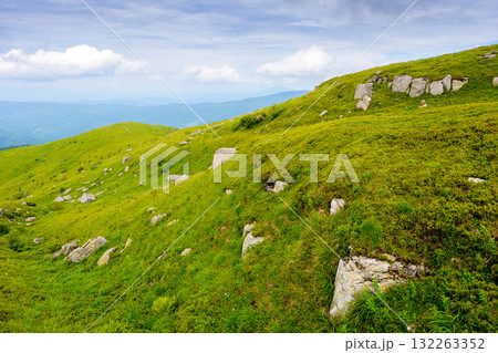 breathtaking mountain landscape with massive rocks on alpine meadow in summer. beautiful nature of carpathian alps. dramatic scenery with hills and green slopes under overcast sky. outdoor adventure breathtaking mountain landscape with massive rocks on alpine meadow in summer. beautiful nature of carpathian alps. dramatic scenery with hills and green slopes under overcast sky. outdoor adventure 132263352