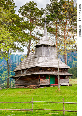 kuzhbeyi, ukraine - 12 may 2019: old wooden church on a hill in abandoned village of transcarpathia region, mizhhirya district. historic lemko architecture heritage 132263360