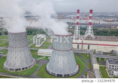 Soaring steam towers of nuclear power plant. 132264970