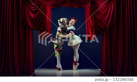 Emotive composition. Mime and ballerina embracing on stage for lighting reference. Emotive composition. Mime and ballerina embracing on stage for lighting reference. 132266388