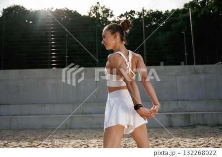 Weekend activity. Young skinny fitness woman is outdoors Weekend activity. Young skinny fitness woman is outdoors 132268022