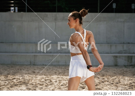 Weekend activity. Young skinny fitness woman is outdoors 132268023