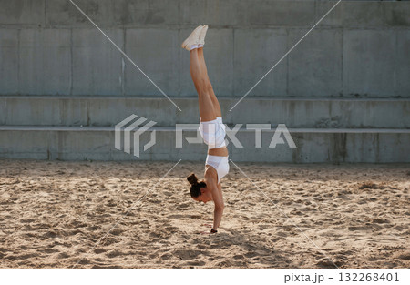Outdoors, fitness conception. Young skinny woman is outdoors Outdoors, fitness conception. Young skinny woman is outdoors 132268401