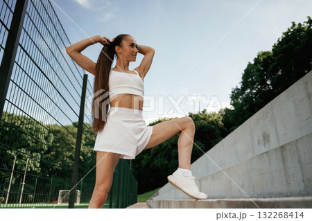Fitness conception. Young skinny woman is outdoors 132268414