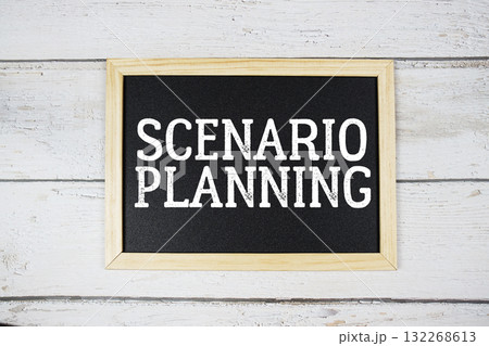 Scenario Planning text with blackboard on wooden background Scenario Planning text with blackboard on wooden background 132268613