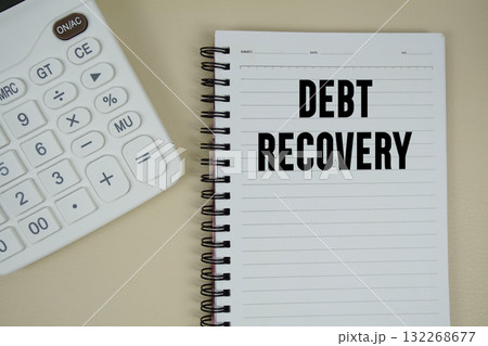 Debt Recovery text with calculator phrase of business and financial concept 132268677