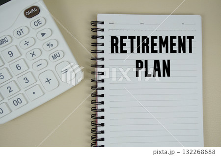Retirement Plan text with calculator phrase of business and financial concept Retirement Plan text with calculator phrase of business and financial concept 132268688