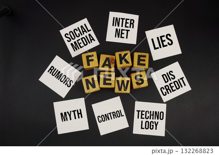 Fake News alphabet letters on black background 132268823