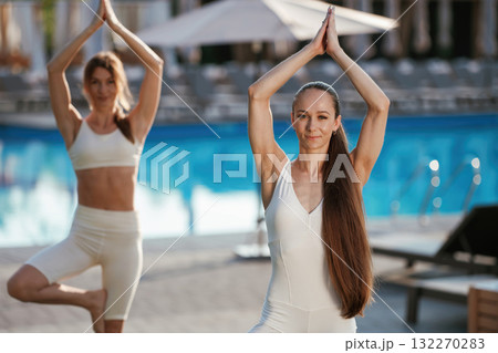 Two fitness women are together outdoors, conception of sport 132270283