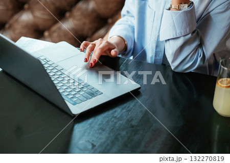 Beautiful woman with laptop is in the bar Beautiful woman with laptop is in the bar 132270819