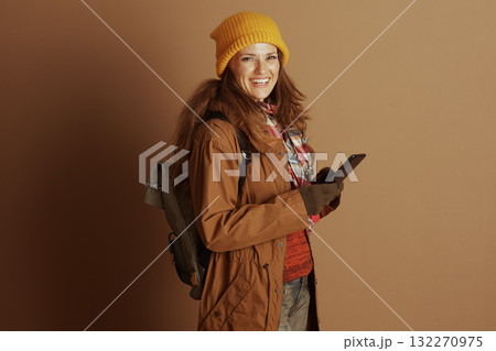Hiker Woman with Smartphone and Backpack 132270975