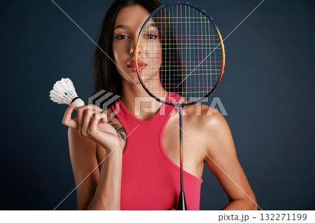 Hobby conception, badminton player. Beautiful young woman is against background Hobby conception, badminton player. Beautiful young woman is against background 132271199
