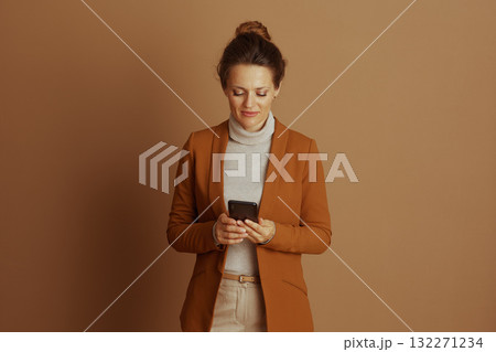 Focused Woman Engaging with Smartphone 132271234