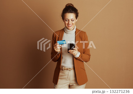 Woman Making Online Payment with Card Woman Making Online Payment with Card 132271236
