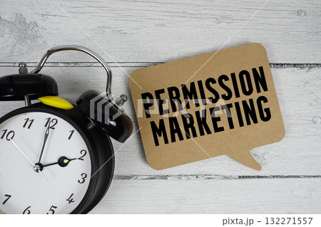 Permission Marketing text with alarm clock on wooden background Permission Marketing text with alarm clock on wooden background 132271557