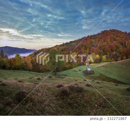 Foggy early morning autumn mountains scene. Peaceful picturesque traveling, seasonal, nature and countryside beauty concept scene. Carpathian Mountains, Ukraine. Foggy early morning autumn mountains scene. Peaceful picturesque traveling, seasonal, nature and countryside beauty concept scene. Carpathian Mountains, Ukraine. 132271867