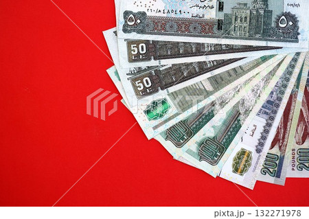 Egyptian pound money bills in big amount on red close up. Finance and banking concept 132271978
