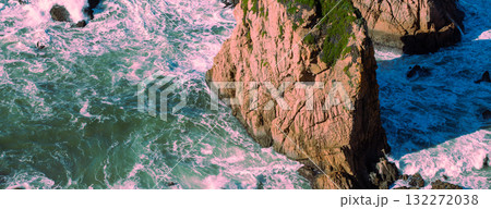 Rocky seascape on a sunny day. View of a sunny bay in Setubal, Portugal. Horizontal banner. Rocky seascape on a sunny day. View of a sunny bay in Setubal, Portugal. Horizontal banner. 132272038