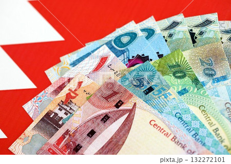 Bahraini dinar currency money bills lies on flag close up. The concept of business and investment 132272101
