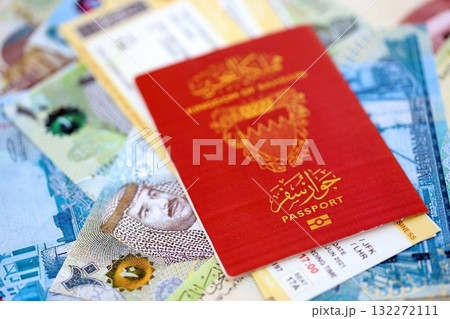 Bahraini dinar currency money bills with tickets and passport close up. The concept of travel and vacation 132272111