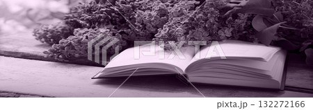 Lilac and book on the table Lilac and book on the table 132272166