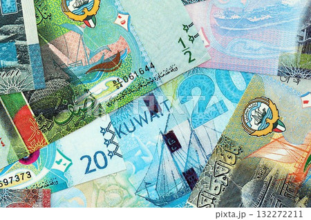 Kuwaiti dinar currency money bills. The current banknotes lies on table in big amount close up 132272211
