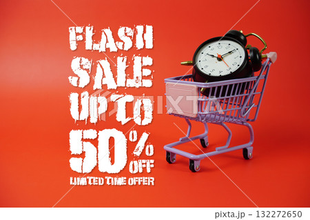 Flash Sale 50% off Promotion and Marketing with trolley shopping cart and alarm clock on red background 132272650