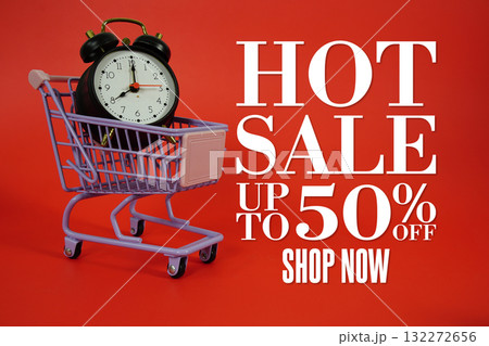 Hot Sale 50% off Promotion and Marketing with trolley shopping cart and alarm clock on red background 132272656