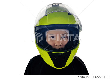 Happy child wearing green helmet isolated on white background 132273162