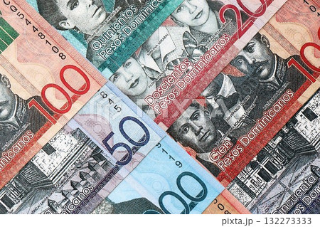 Dominican Republic Pesos currency money bills. DOP currency banknotes in big amount with different denomination close up Dominican Republic Pesos currency money bills. DOP currency banknotes in big amount with different denomination close up 132273333