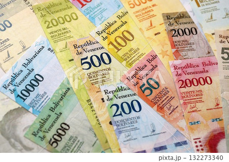 Venezuelan Bolivar currency money bills in stack. VED currency banknotes with different denomination close up Venezuelan Bolivar currency money bills in stack. VED currency banknotes with different denomination close up 132273340