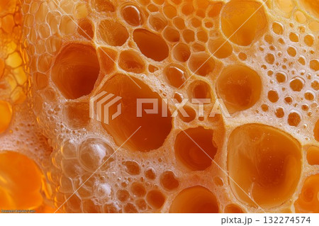 Detailed honeycomb filled with golden honey, captured in warm lighting. Hexagonal pattern, macro perspective. Neural network AI generated 132274574
