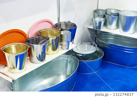 Metal tin buckets in store 132274837