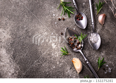 Rosemary, garlic, salt and pepper. 132275281
