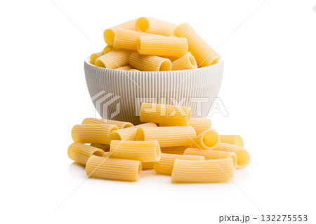 Uncooked rigatoni pasta isolated on white background. 132275553