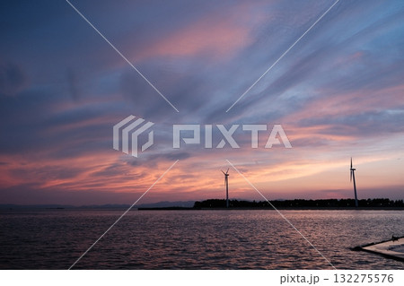 Colorful Sunset Water Wind Turbine Tranquil Sky Colorful Sunset Water Wind Turbine Tranquil Sky 132275576