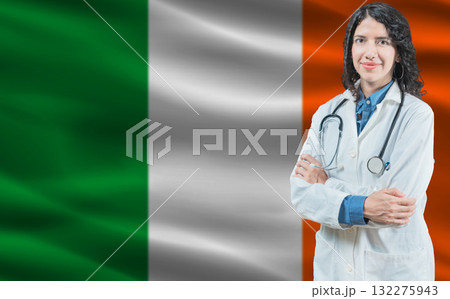 Irish medicine and healthcare concept. Close up of doctor against Ireland flag background 132275943