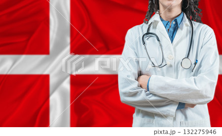 Medical professional on Denmark flag. Healthcare and wellness in Denmark, Concept 132275946