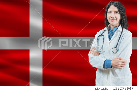 Danish medicine and healthcare concept. Close up of doctor against Denmark flag background 132275947