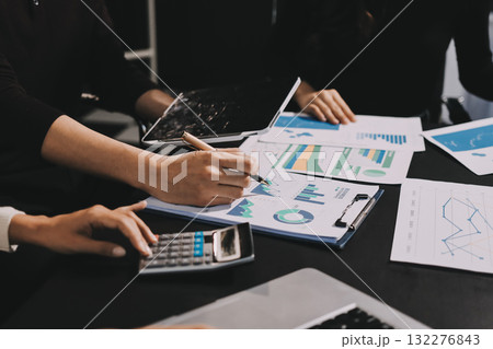 Accounting company provide finance and taxation planning for profitable cash flow, Auditor and accountant team working in office, analyze financial data and accounting record with calculator.Insight 132276843