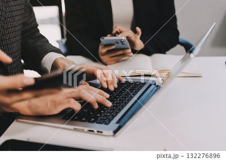 Accounting company provide finance and taxation planning for profitable cash flow, Auditor and accountant team working in office, analyze financial data and accounting record with calculator.Insight 132276896