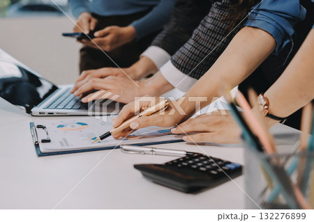Accounting company provide finance and taxation planning for profitable cash flow, Auditor and accountant team working in office, analyze financial data and accounting record with calculator.Insight 132276899