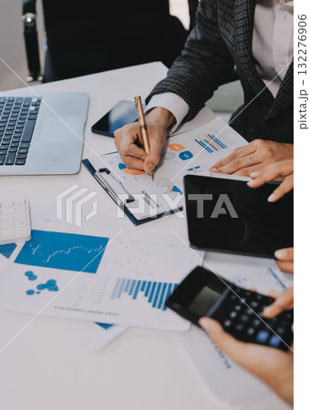 Accounting company provide finance and taxation planning for profitable cash flow, Auditor and accountant team working in office, analyze financial data and accounting record with calculator.Insight 132276906