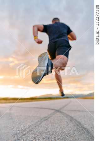 Sunset Runner Embracing the Serenity of Dusk with Every Stride 132277388