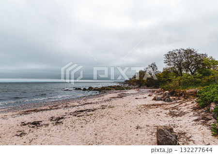 Sea sandy beach in cloudy weather. Seascape 132277644