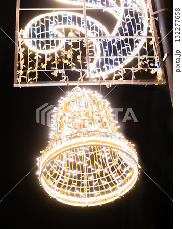 Festive bell and ornament made of bright white lights. Festive bell and ornament made of bright white lights. 132277658