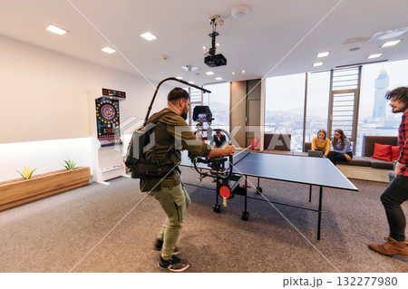 Videographer Captures Business Colleagues Playing Table Tennis During Break Videographer Captures Business Colleagues Playing Table Tennis During Break 132277980