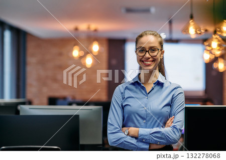Confident Businesswoman: Blonde Executive Demonstrating Leadership with Crossed Arms. Confident Businesswoman: Blonde Executive Demonstrating Leadership with Crossed Arms. 132278068